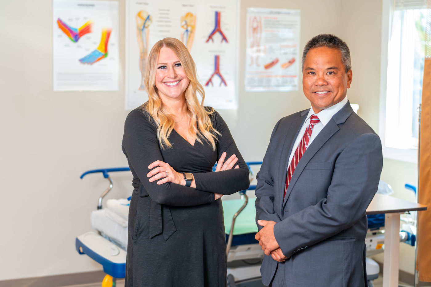 Nurse Practitioner Heather Riley and Dr. Roberto A Corpus in patient recovery and prep room.